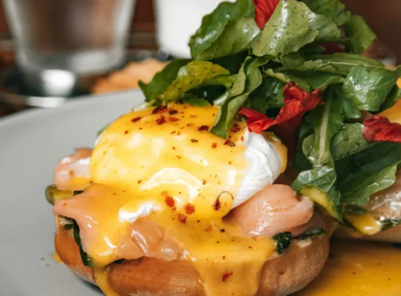 a poached egg with smoked salmon on toast